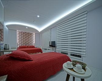 Cappadocia Symbol Hotel - Uchisar - ห้องนอน