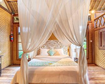 Santai Hotel - Abang - Habitación