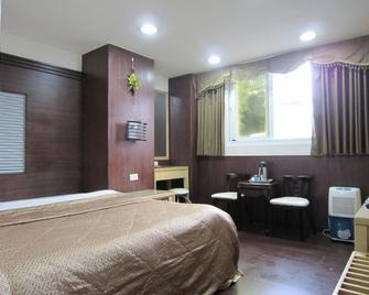 Ho Fong Villa Hotel - Alishan Township - Slaapkamer