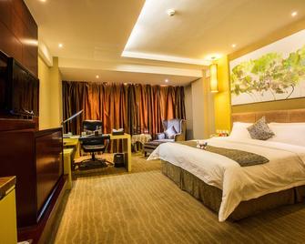 Changchun Huatian Hotel - Changchun - Habitación