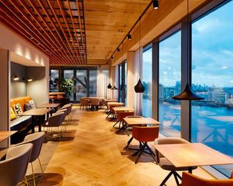 Residence Inn by Marriott Amsterdam Houthavens - Ámsterdam - Restaurante
