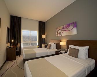 Action Hotel Ras Al Khaimah - Ras Al Khaimah - Habitación