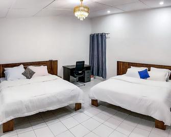 Tranquil Residence - Abidjan - Quarto