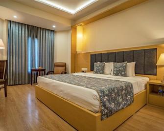 Golden Tulip Udaipur - Udaipur - Habitación