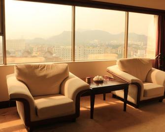 Junyi Hotel - Shenzhen - Living room