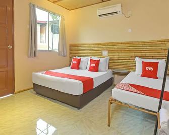 Capital O 90665 Countryview Recreation Park & Resort - Benta - Camera da letto