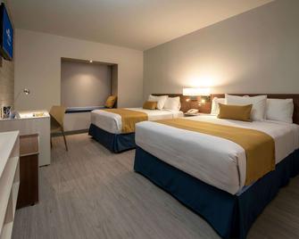 Microtel Inn & Suites by Wyndham Guadalajara Sur - Guadalajara - Slaapkamer