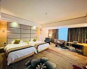 Sg Hotel - Yulin - Habitación