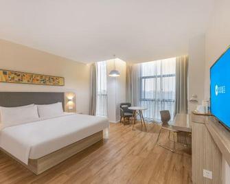 Hanting Hotel Nantong Tongzhou Aobang Plaza - Nantong - Habitación