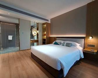 Yichang Guobin Garden Hotel - Yichang - Bedroom