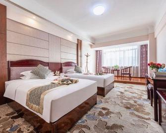 Hongrui Holiday Hotel - Lanzhou - Schlafzimmer