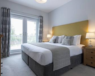 Inverness City Suites - Inverness - Schlafzimmer