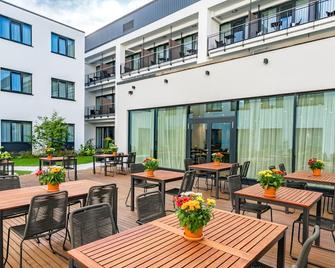 Wyndham Garden Munich Messe - Munich - Patio
