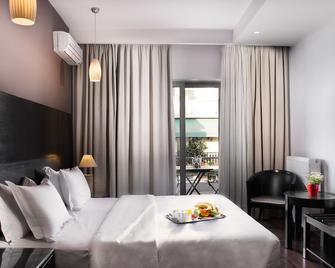 Areos - Atenas - Habitación