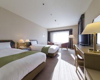 Akiu Resort Hotel Crescent - Сендай - Спальня