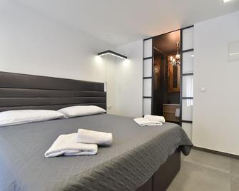 Mono Apartments & Rooms - Задар - Спальня