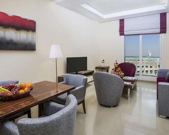 The View Al Barsha Hotel Apartments - Dubai - Living room