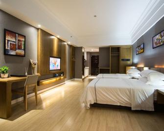 Qingdao Haiyue Home Resort Hotel - Qingdao - Habitación