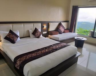 Hotel Sejal By Nexottel - Saputara - Bedroom