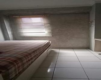 Sewaunitkalcit - Yakarta - Habitación