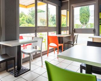 B&B HOTEL Nîmes Caissargues - Caissargues - Restaurante
