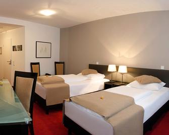 Homaris Corner Hotel - Frankfurt - Kamar Tidur